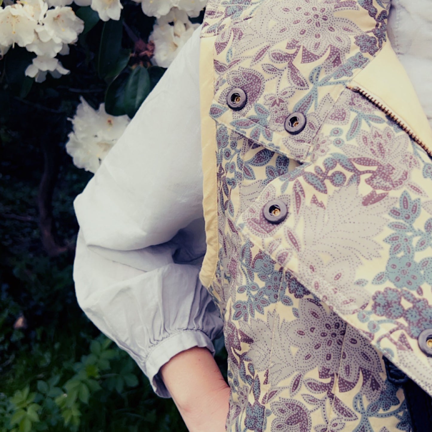 Quilted Frida sleeveless jacket in woodland floral print cotton lawn.