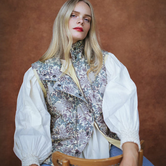 Quilted Frida sleeveless jacket in woodland floral print cotton lawn.