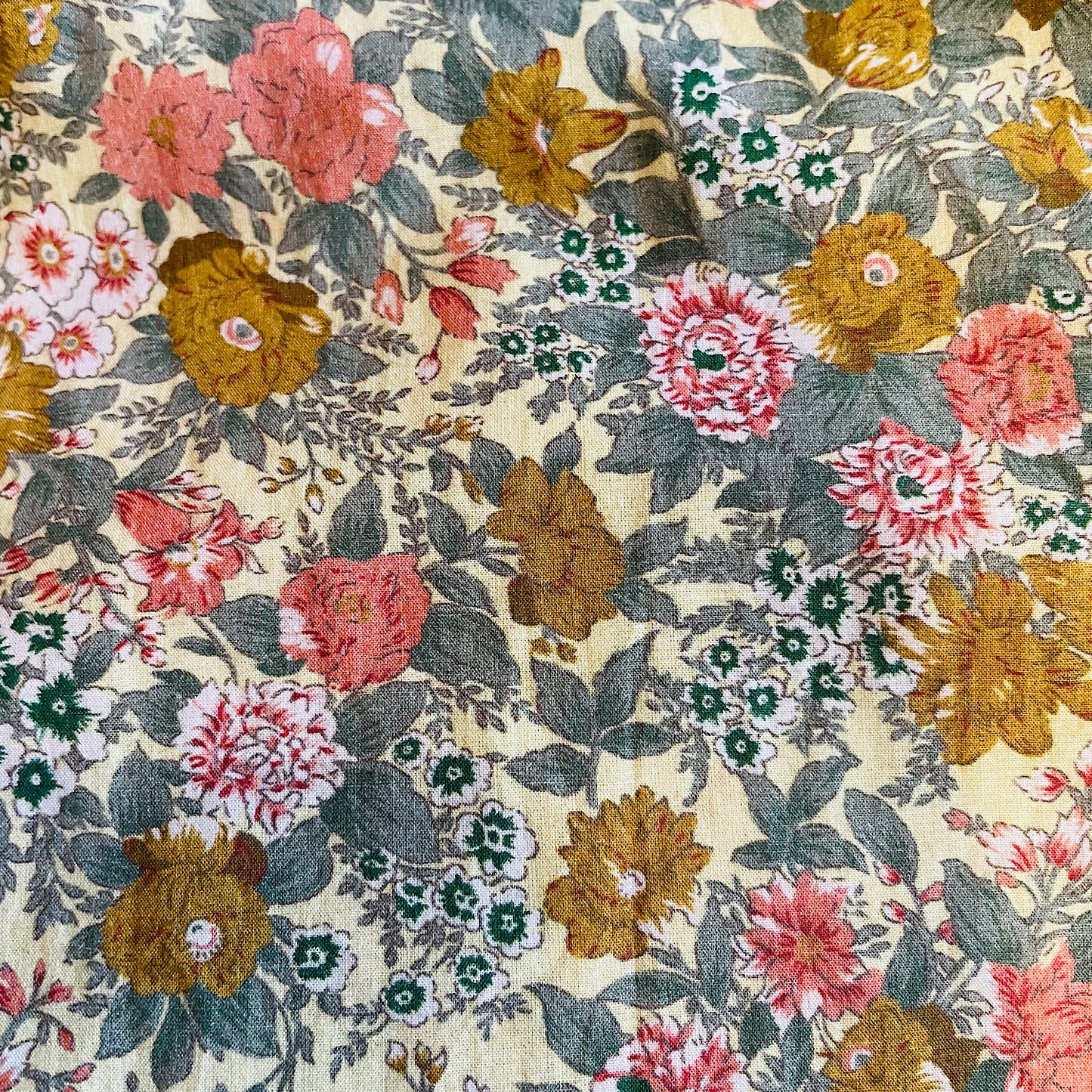 Stevie quilted waistcoat, summer meadow floral print in cotton lawn.