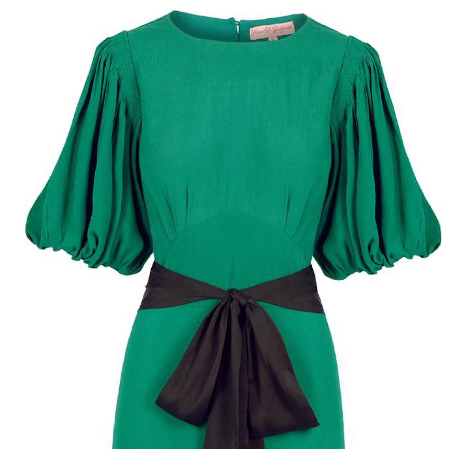 Clemence dress in jewel green viscose crepe with contrast black satin belt.