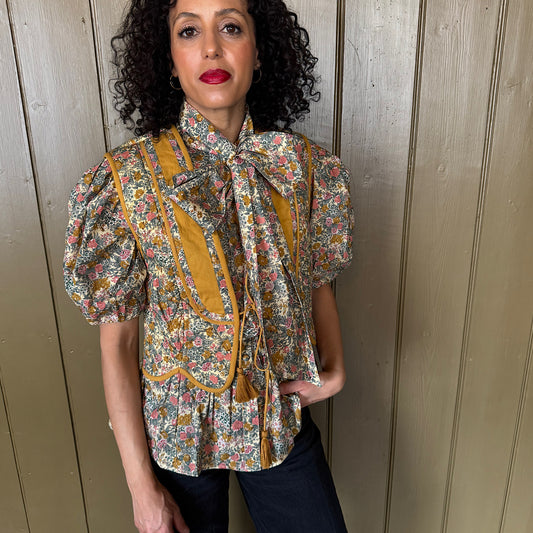 Stevie quilted waistcoat, summer meadow floral print in cotton lawn.