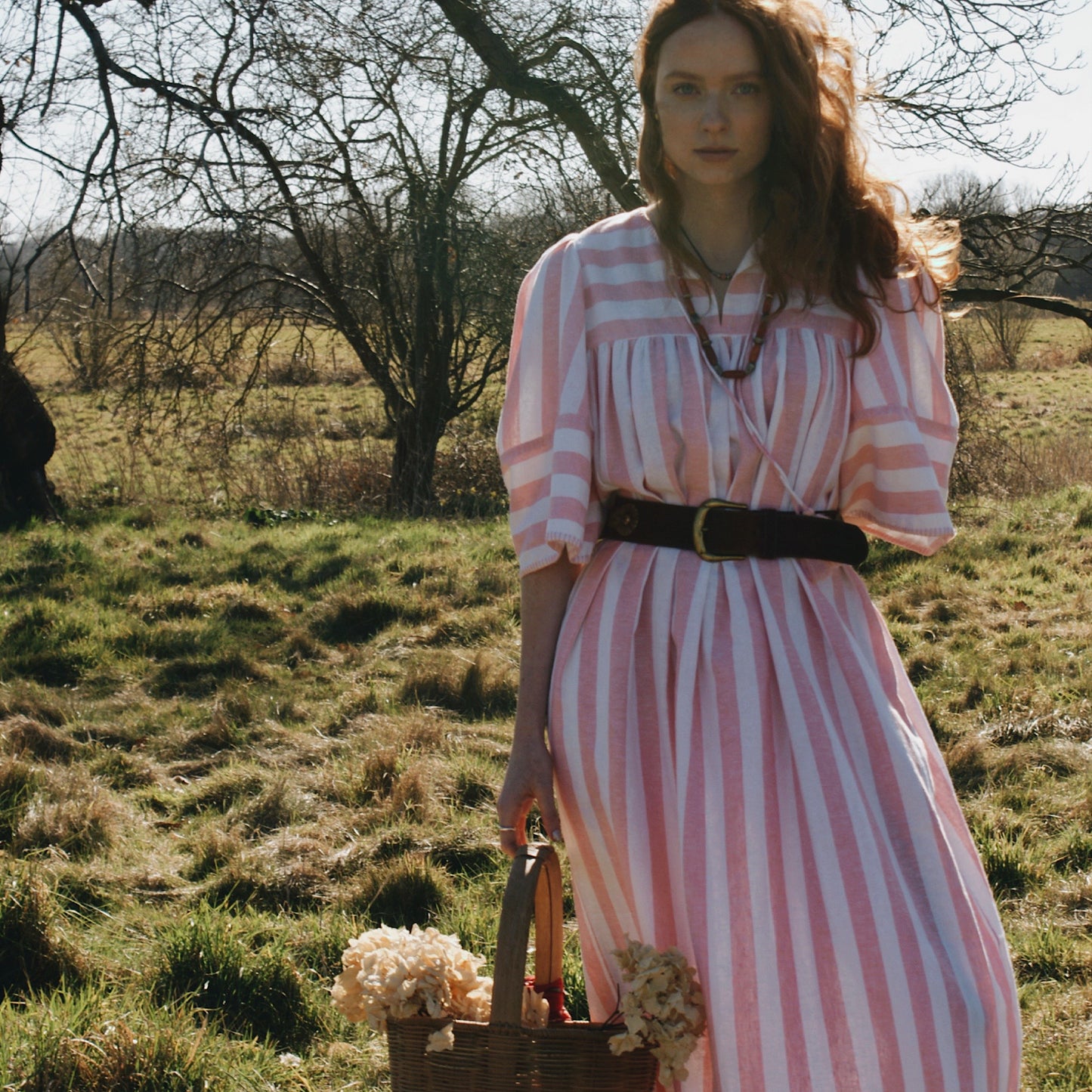 Margot dress in candy striped cotton with angel sleeves and tie belt.