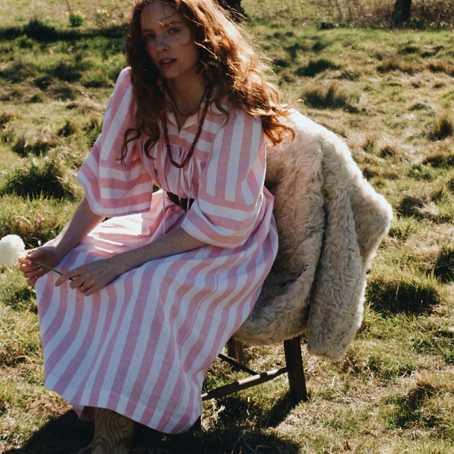 Margot dress in candy striped cotton with angel sleeves and tie belt.