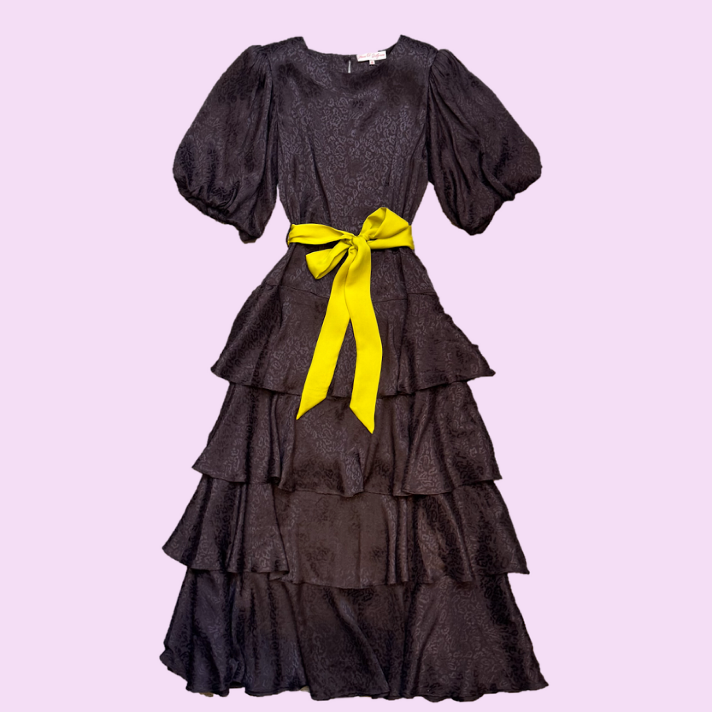 Lou-Lou dress in rich chocolate leopard print jacquard, with contrast belt and tiered skirt.