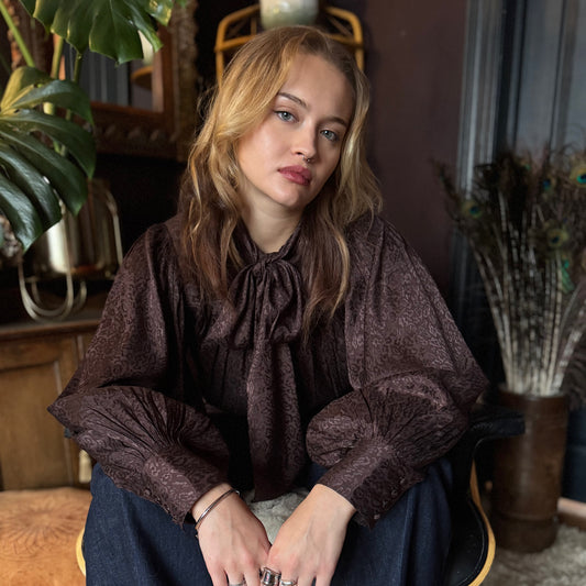 Delphi bow blouse in rich chocolate viscose with leopard jacquard design