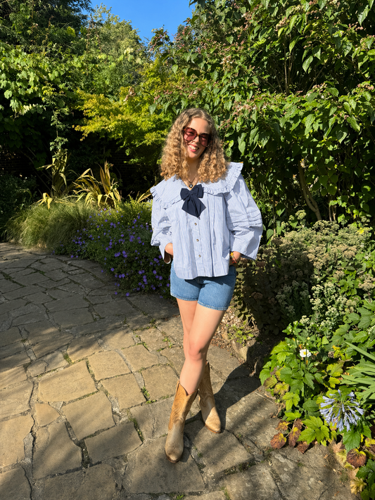 Lila blouse in blue and white striped organic cotton with big peter pan collar and navy detachable bow