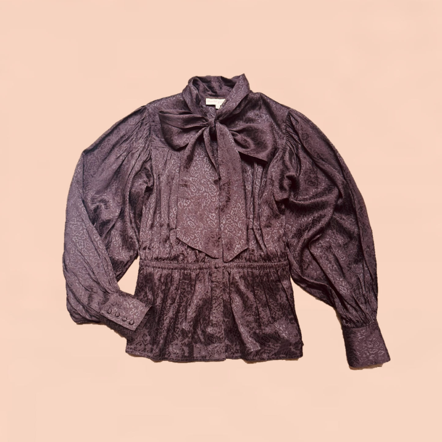 Delphi bow blouse in rich chocolate viscose with leopard jacquard design