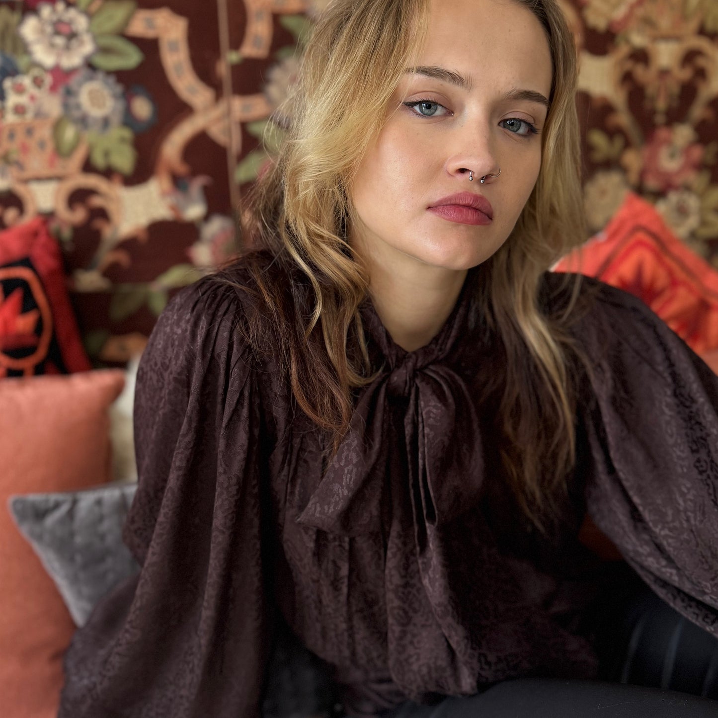 Delphi bow blouse in rich chocolate viscose with leopard jacquard design