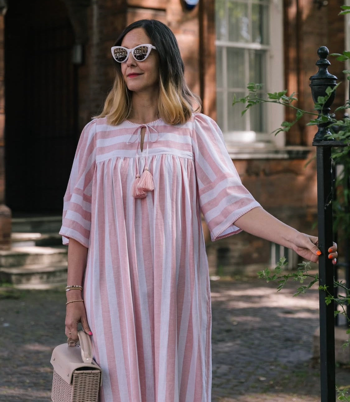 Margot dress in candy striped cotton with angel sleeves and tie belt.