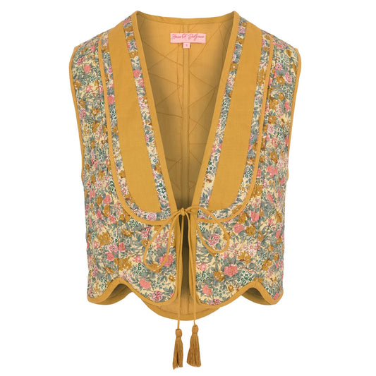 Stevie quilted waistcoat, summer meadow floral print in cotton lawn.