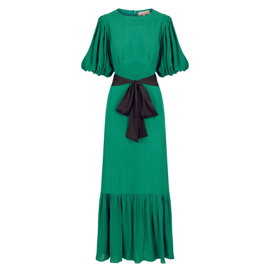 Clemence dress in jewel green viscose crepe with contrast black satin belt.